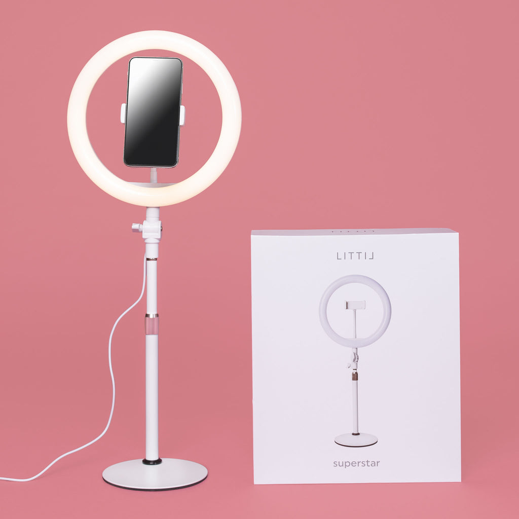 LITTIL Superstar Ring Light with product box on a pink background.